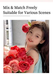 Detailed view of layered artificial silk roses in red and pink colors for home decor