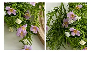 Detailed close-up of artificial purple baby's breath flowers with green water grass leaves