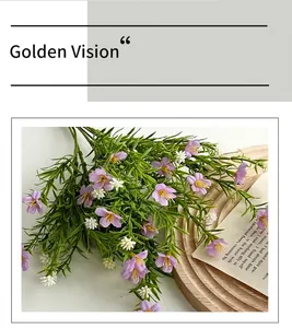 Detailed view of artificial purple and white baby breath flowers in a wooden tray