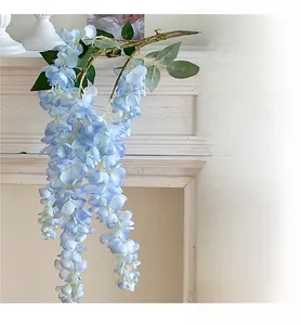 Detail of blue-purple silk wisteria hanging branches for elegant home and wedding decor