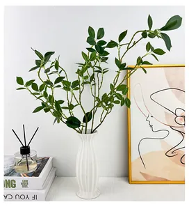 Feuilles de banian artificielles en vase céramique côtelé pour décor moderne