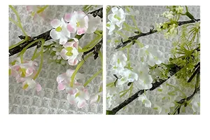 Close-up of white and pink artificial willow flowers with realistic textured stems