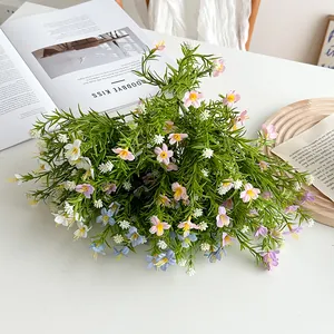 Lifelike artificial flower bouquet with colorful blooms and green leaves for home decor