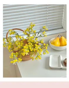 Handcrafted wicker basket filled with vibrant yellow baby breath flowers for home decor