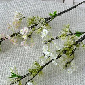 Artificial snow willow branch with white flowers for elegant living room decor