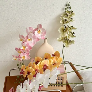 Lifelike 9-head butterfly orchid artificial flowers in pink, yellow, white, and green