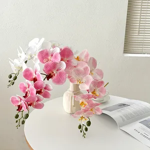 Luxury 9-head white Phalaenopsis orchid in cream matte vase for home table decor