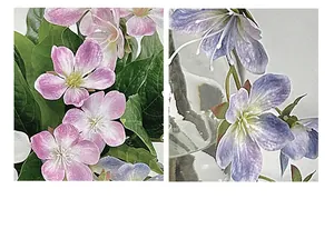 Macro detail of 3D printed pink jasmine flowers with realistic petal texture and green leaves
