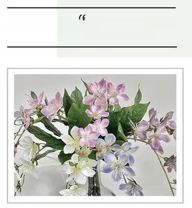 Detailed view of 3D printed silk jasmine flowers in pink, blue, and white tones