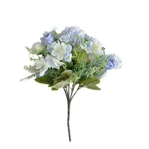 Artificial bouquet with blue roses and white hydrangeas for wedding decor