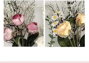 Detail van kunstboeket met roze rozen en witte madeliefjes voor interieurdecoratie