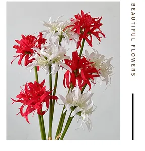 Detailed view of red and white artificial Lycoris Radiata flowers with realistic petals