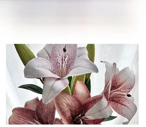 Close-up of artificial 3D lily with realistic pink gradient petals and green buds