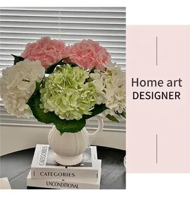 Detail of 3D moisturizing artificial hydrangeas in a white pumpkin ceramic vase