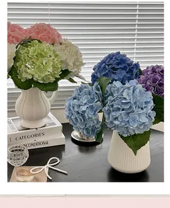 Detail of 3D lifelike artificial hydrangeas in ceramic vases with realistic petal texture