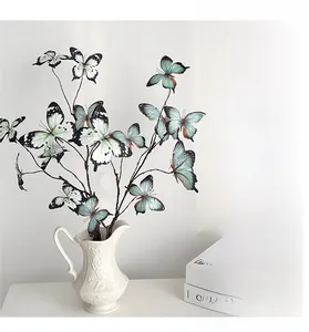 Detail of 3D printed butterfly floral branches in an embossed ceramic vase for home decor