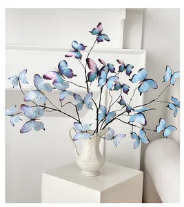 Artistic 3D butterfly branches with gradient blue wings in a white ceramic vase