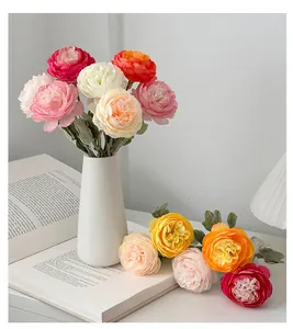 Detailed close-up of vibrant artificial Persian buttercups with lifelike silk petals