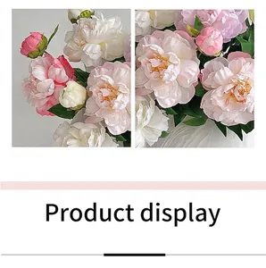 Vue détaillée de pivoines artificielles de haute qualité dans un vase en céramique blanche
