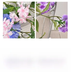 Detailed view of pink and purple silk freesia petals and green leaves for home decor