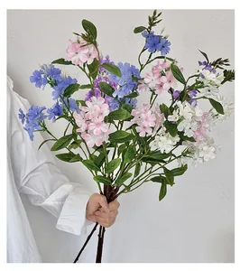 Detail of colorful artificial phlox bouquet with realistic pink and blue silk flower petals
