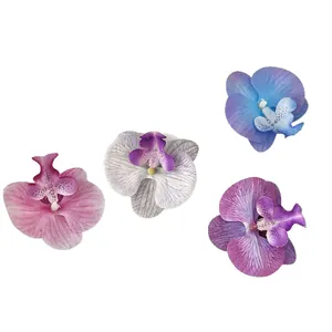 Kunstmatige orchideeënbloemhoofdjes in paars, roze en wit voor DIY-decoraties