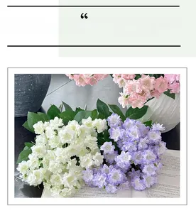 Detailed view of realistic silk jasmine and begonia flowers in pink and purple colors