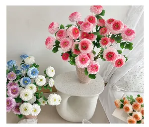 Detailed view of assorted artificial peony flowers in multiple colors for home decoration