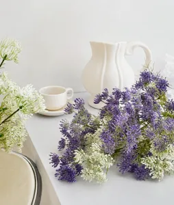 Macro shot of purple and white lace artificial flower clusters for home decor