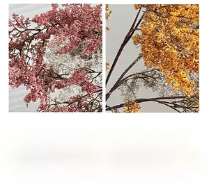 Dettaglio di piante finte realistiche rosa e arancioni per decorazione d'interni