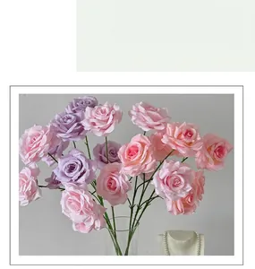 Close-up of artificial pink and purple diamond roses with realistic layered petals