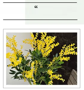 Gros plan d'un bouquet de mimosa jaune artificiel avec fleurs en peluche pour la maison