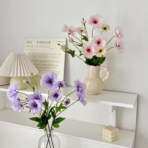 Artificial butterfly peony flowers in ceramic vases for home decor and photography props