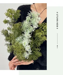 Detail of purple artificial fern with frosted texture for modern home flower decor
