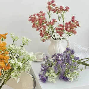Lace artificial flowers in pink, purple, white and orange for home decor with ceramic vase