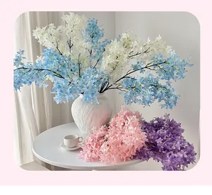 Close-up of dense artificial lilac flower petals in various colors for home decor
