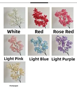 Detailed palette of artificial cherry blossom branches in seven vibrant floral colors