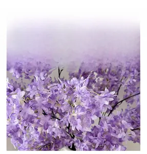 Macro detail of dense purple faux lilac petals with gradient color and white stamens