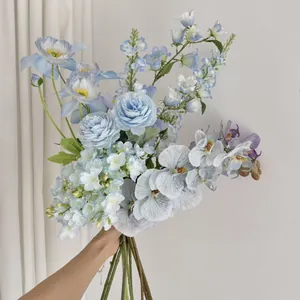 Close-up of blue artificial roses and silk hydrangeas bouquet with realistic textures