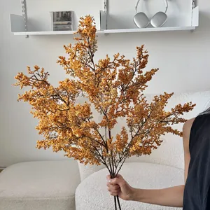 Bouquet rigoglioso di mimose finte arancioni per arredamento e fotografia