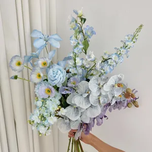 Handheld blue silk flower bouquet with orchids and hydrangeas for elegant home decor