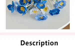 Detailed view of artificial Iceland poppies with blue and white petals and yellow cores