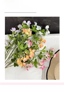 Macro detail of artificial sweet pea flowers with realistic colorful petals for home decor