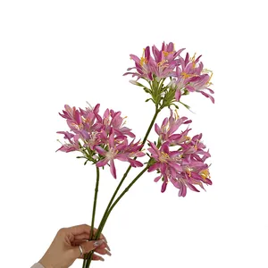 Three stems of purple silk agapanthus flowers for home decor and wedding background