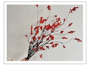 Detailed view of artificial red berry stems for Zen-style floral arrangements