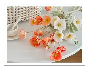 Detailed view of artificial poppy flowers with flocked stems and soft silk petals
