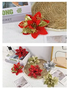 Detailed view of artificial Christmas flowers with glitter petals in various festive colors