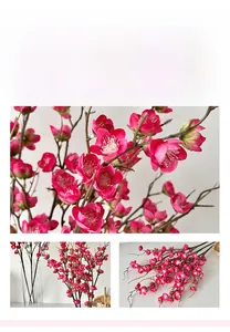 Close-up of pink artificial peach blossoms with realistic woody texture and white stamens