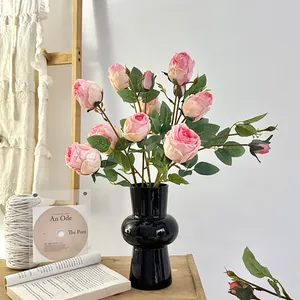 French oil painting style artificial pink roses in a black ceramic vase for home decor