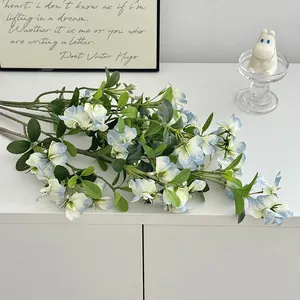 Elegant white and blue gradient sweet pea silk flowers in a modern home decor setting